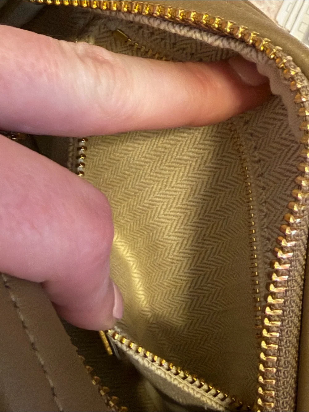 Tory Burch Kira Chevron Small Camera Bag in the color “Sandpiper”